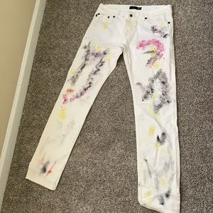 Paint splashed white jeans